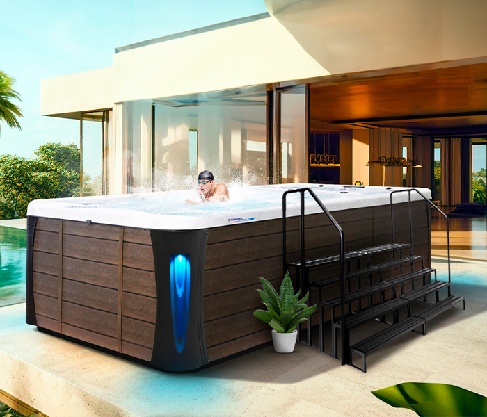 Calspas hot tub being used in a family setting - Utica